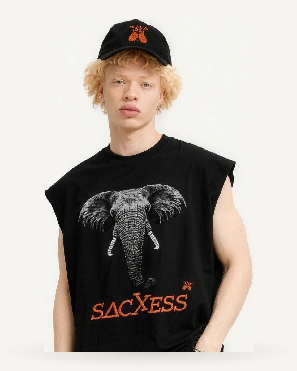 SACXESS Elephant Ed. Tank Top worn with the SACXESS shorts and cap.